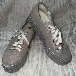 Rose Gold Kate Spade Keds platform sneakers.